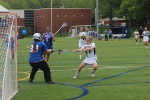 Senior attacker Hilary Kargl shoots and scores against Concordia Wisconsin on Sunday, May, 10. The Vikings went on to win with a score of 19-13. 
