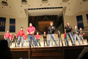 Group performs at Augustana's SING competition. Photo by Brianna Snead.