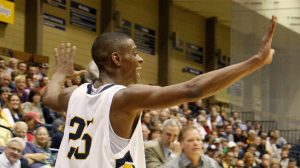 Junior Tayvian Johnson, starting forward on the Augustana men’s basketball team, cites his family and his coach Grey Giovanine as the positive influences leading him to apply, and succeed, at Augustana. Photo courtesy of Benjamin Payne.